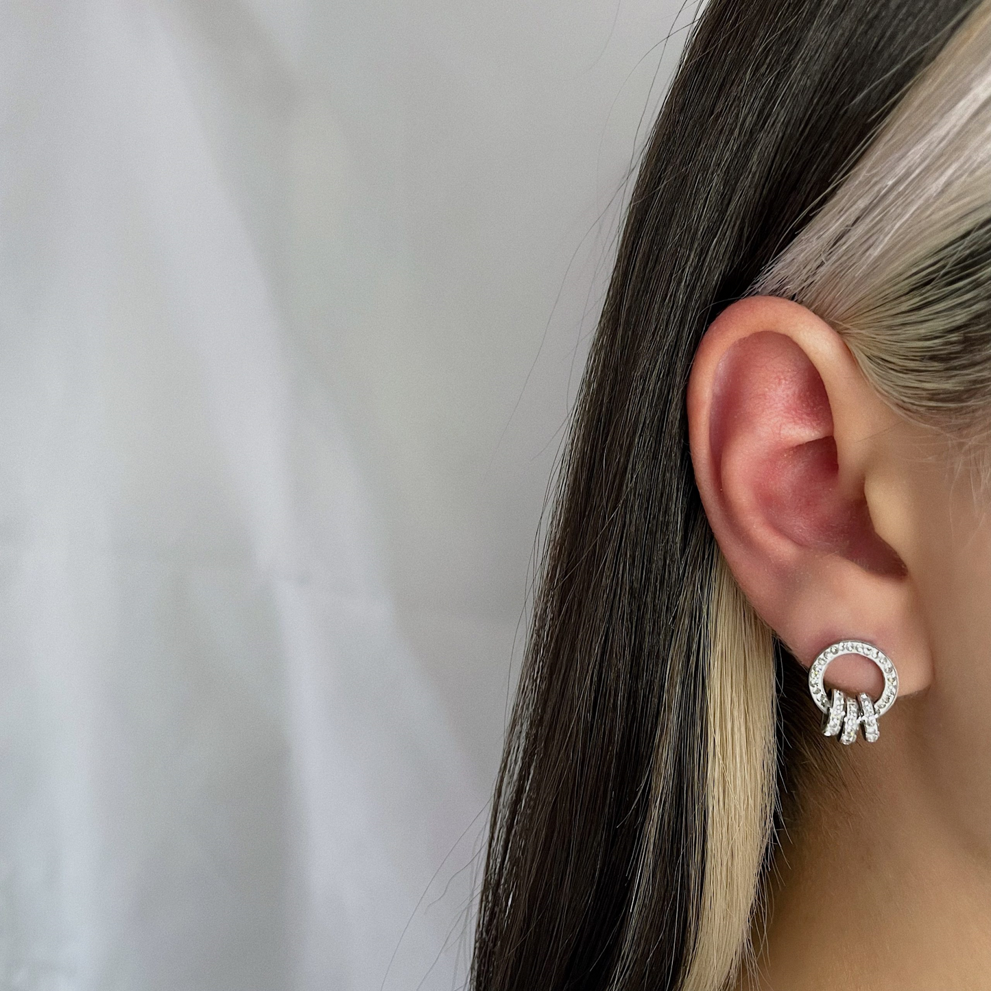 TRIPLED-RINGS EARRING